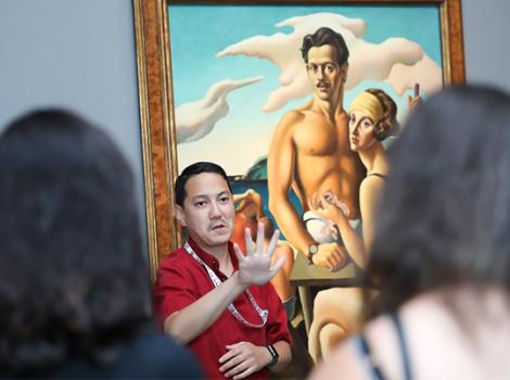 Docent giving an ASL tour in the gallery