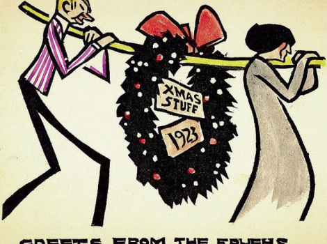 Two people carrying a pole with wreath between them