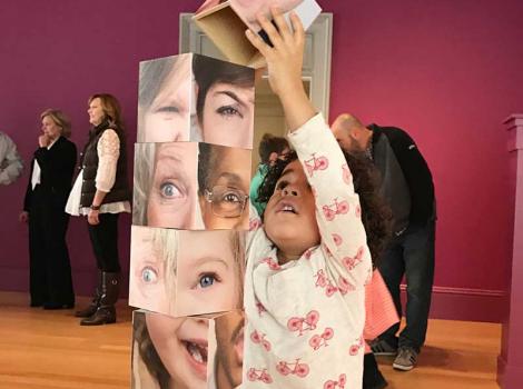 Little girl stacking blocks